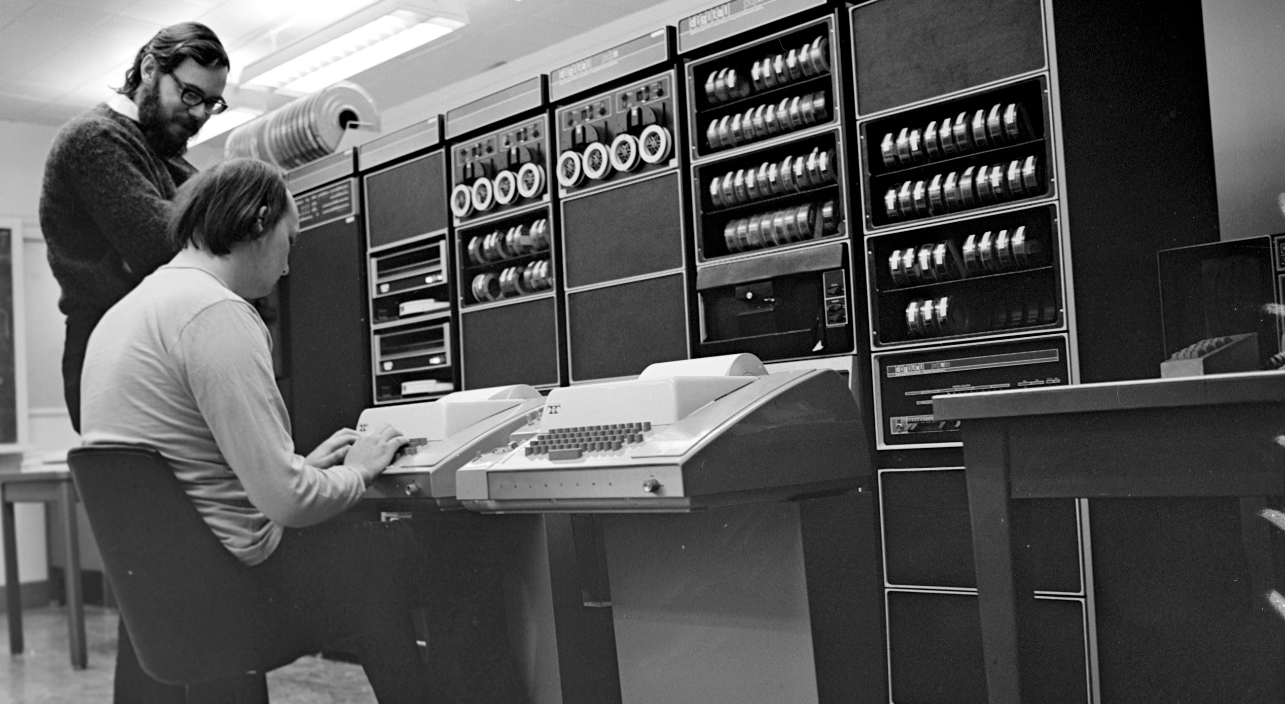 Thompson (sitting) and Ritchie working together at a PDP-11